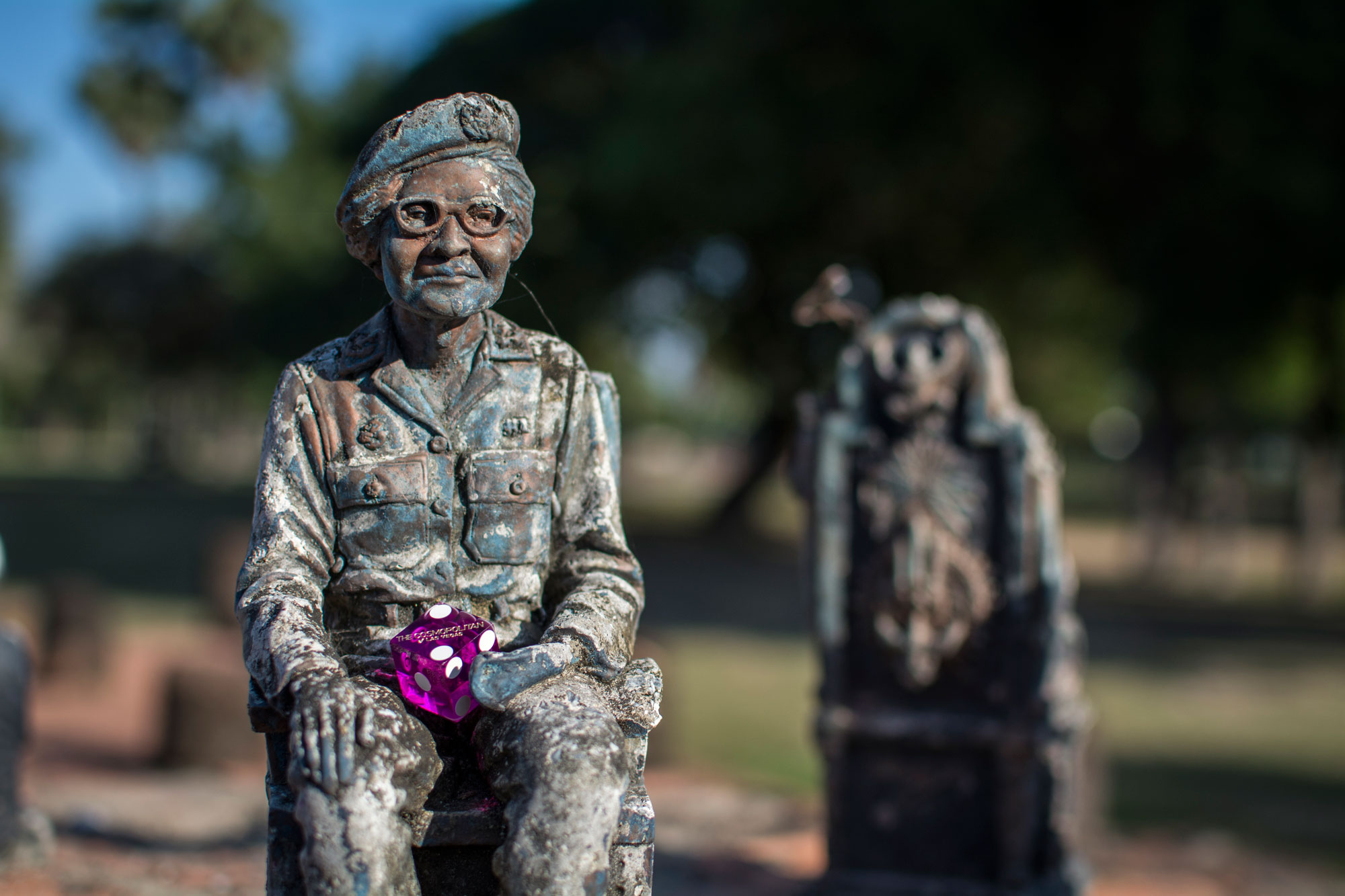 Dice with statue